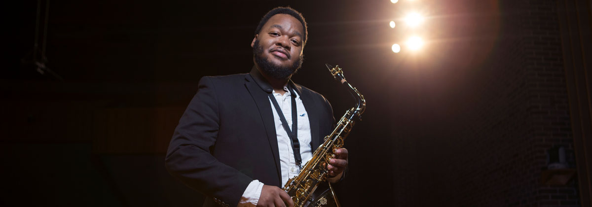NIU student Keelan Wright with his saxophone.