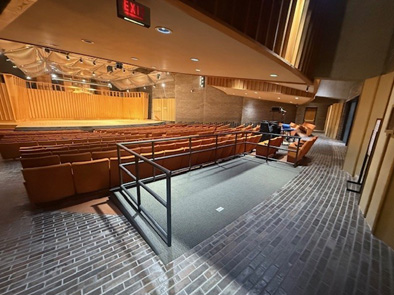 Interior of Boutell concert hall looking in from the west entrance toward wheelchair-accessible seating